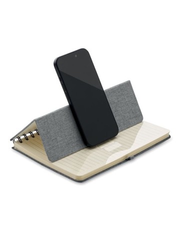 Cahier A5 publicitaire avec support de téléphone STRATA Matières : papier recyclé Couleurs : gris objet promotionnel éco-respons