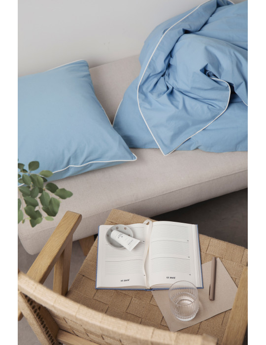 Linge de lit Vinga Marston quatre pièces coton OCS publicitaire